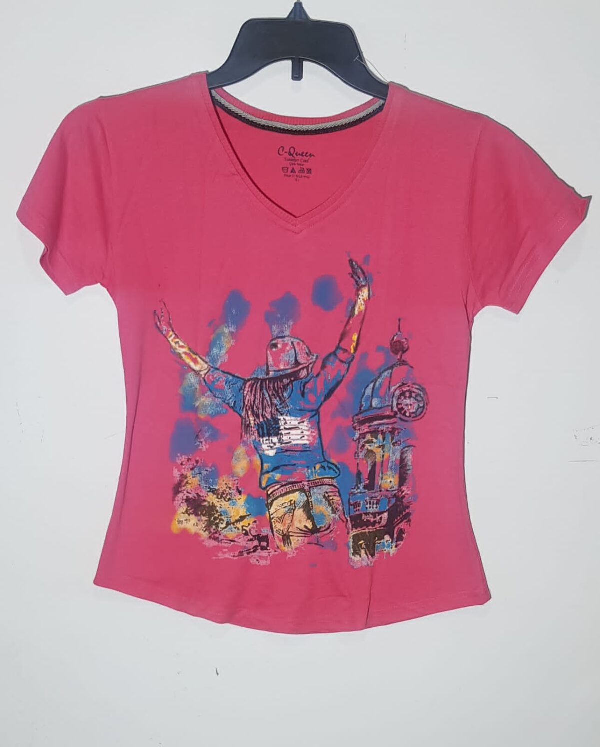 Print: The T-shirt features a printed design, which could include various patterns, graphics, or text. The print could be floral, abstract, geometric, or even include slogans or artwork. Color: Pink (specific shade may vary, such as pastel pink, hot pink, or any other shade of pink). Sleeves: The sleeves can vary from short sleeves to long sleeves, depending on the design and your preference. Neckline: Choose a neckline that suits your style, such as a crewneck, V-neck, or scoop neck. Fit: Opt for a comfortable fit, whether it's a relaxed fit, a slightly fitted style, or an oversized look. Fabric: Consider a soft and breathable fabric like cotton or a cotton blend for everyday comfort.