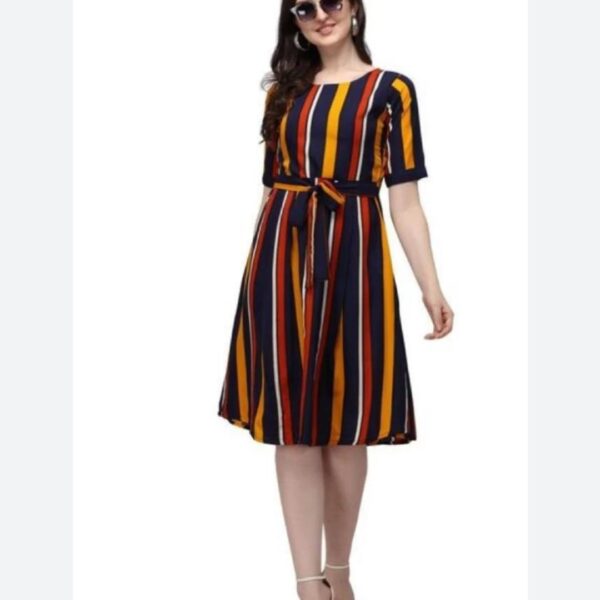 This dress boasts a lively and colorful print that captures the essence of casual elegance. The design is tastefully crafted, ensuring a versatile look that suits various occasions. The playful mix of colors adds a touch of vibrancy, making it a charming addition to your wardrobe.