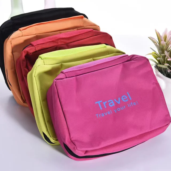 The Travel Cosmetics Bag (JA0033) is a compact and convenient solution for organizing and carrying your beauty essentials during travel. Designed with functionality in mind, this bag offers ample storage space for cosmetics, toiletries, and other personal items. Its durable construction and secure zipper closure ensure the safety of your items while on the go. The bag's compact size makes it easy to fit into luggage or carry-on bags. With multiple compartments and pockets, it allows for efficient organization, keeping your beauty products easily accessible. The Travel Cosmetics Bag is a stylish and practical accessory for those who prioritize convenience and orderliness in their travel routines.