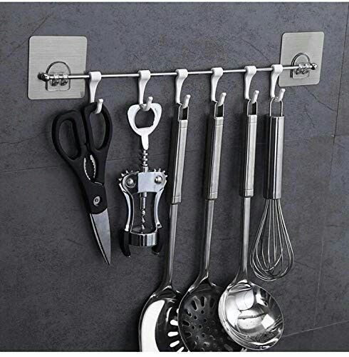 The Self Adhesive 6 Pcs Steel Hook (Box Pack) is a set of six steel hooks designed for easy installation without the need for screws or nails. Each hook comes with a self-adhesive backing, allowing them to be securely attached to various surfaces, such as walls or doors. The box pack includes all six hooks, making it convenient for organizing items in your home or office. These hooks are practical for hanging lightweight items and offer a simple and efficient solution for storage needs.