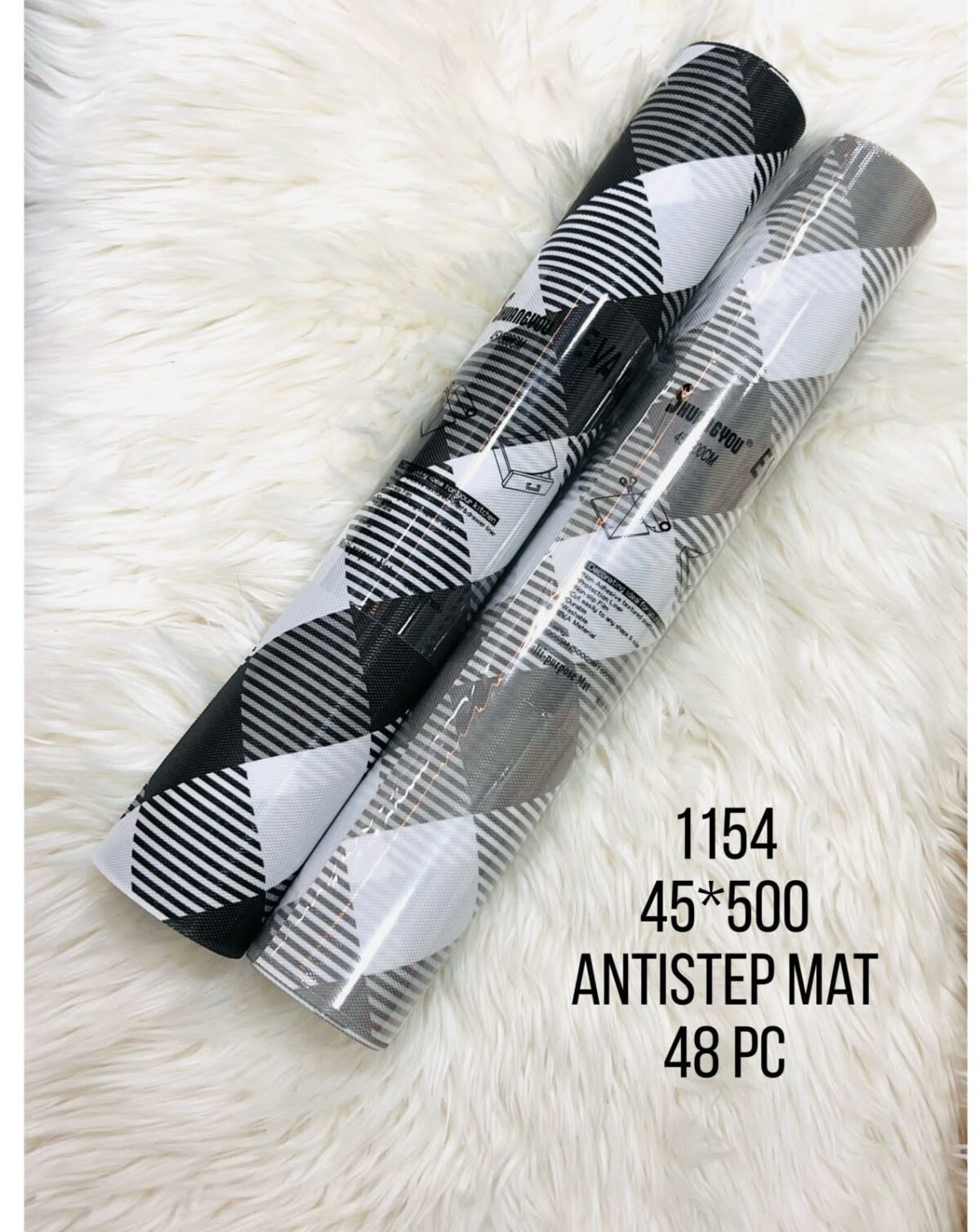 An "anti-slip mat roll (45*500cm)" is a roll of material that is 45 centimeters wide and 500 centimeters long, designed to provide a non-slip surface. It is commonly used to line drawers, shelves, or other surfaces to prevent items from sliding and to increase stability.