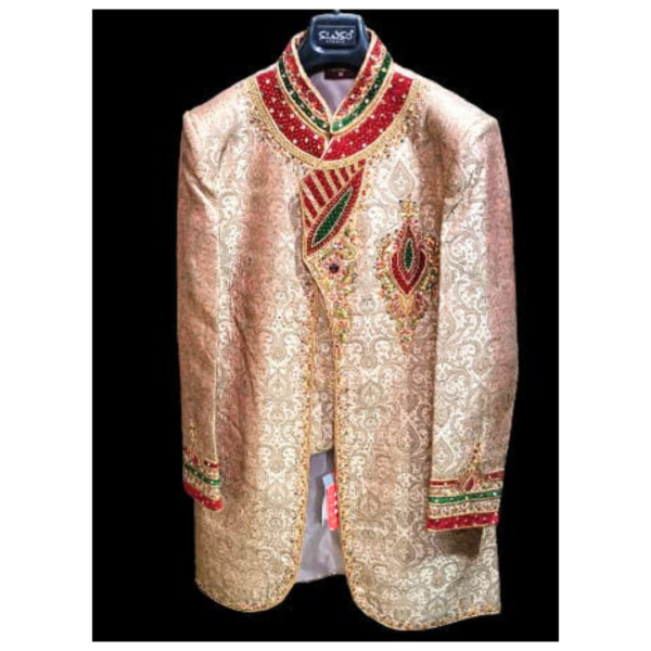 The cream hue, symbolic of purity and grace, adds a touch of understated grandeur, making it an ideal choice for a groom's attire. The meticulously embroidered patterns showcase the artistry of skilled craftsmen, with intricate details and embellishments that elevate the sherwani to a work of art