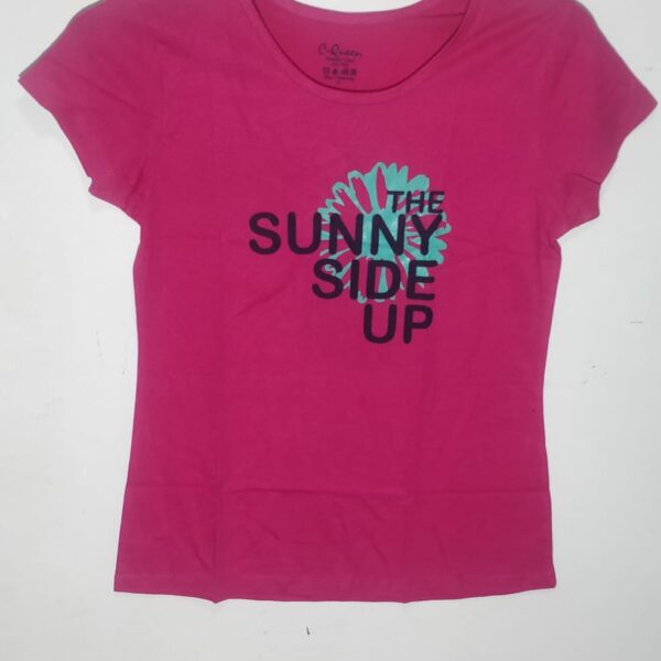 Color: Pink (specific shade may vary, such as pastel pink, hot pink, or any other hue of pink). Print: The T-shirt features the playful and positive phrase "THE SUNNY SIDE UP," possibly accompanied by graphics or illustrations related to sunshine or a sunny disposition. Sleeves: The sleeves can vary from short sleeves to long sleeves, depending on your preference and the season. Neckline: Choose a neckline that suits your style, such as a crewneck, V-neck, or scoop neck. Fit: Opt for a comfortable fit, whether it's a relaxed fit, a slightly fitted style, or an oversized look. Fabric: Choose a soft and breathable fabric like cotton for everyday comfort.