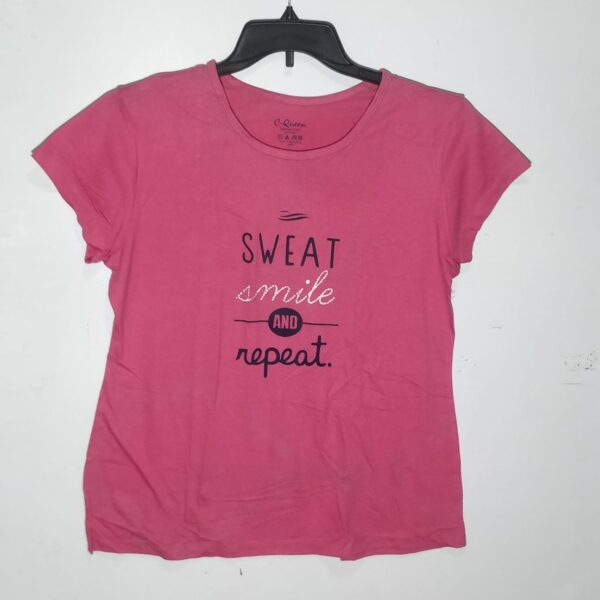 Color: Pink (specific shade may vary, such as pastel pink, hot pink, or any other hue of pink). Print: The T-shirt features the motivational phrase "SWEAT SMILE & REPEAT," often in a bold and empowering font. The design may include additional graphics related to fitness or an active lifestyle. Sleeves: The sleeves can vary from short sleeves to long sleeves, depending on your preference and the season. Neckline: Choose a neckline that suits your style, such as a crewneck, V-neck, or scoop neck. Fit: Opt for a comfortable fit, whether it's a relaxed fit, a slightly fitted style, or an oversized look. Fabric: Choose a soft and breathable fabric like cotton or a moisture-wicking material for comfort during workouts.