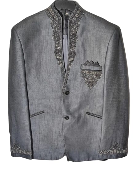 The fabric used for a Jodhpuri blazer is chosen with care, with luxurious materials such as silk, brocade, or velvet being popular choices. These fabrics not only enhance the aesthetic appeal but also contribute to the comfort of the wearer. The blazer may be further embellished with ornate buttons, giving it a touch of opulence.