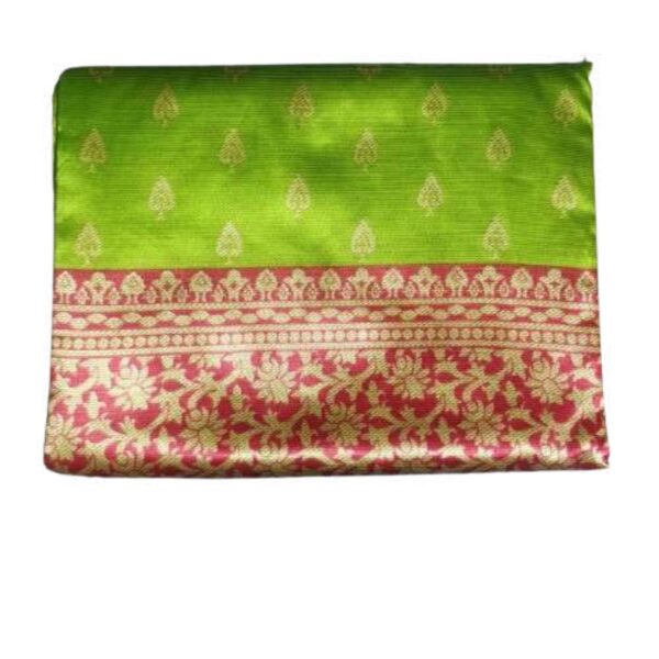 A semi Kanchipuram saree in green and pink would likely be a beautiful traditional Indian silk saree that combines the elegance of Kanchipuram silk with a semi-silk fabric. Kanchipuram sarees are renowned for their rich silk, vibrant colors, and intricate zari (metallic thread) work.