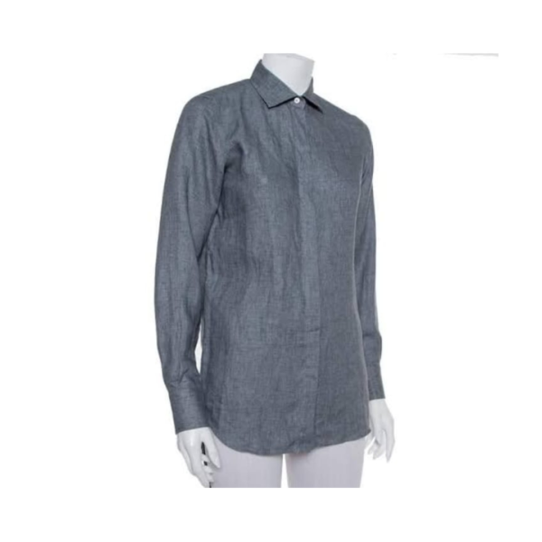 A Boys' Long Sleeve Dress Shirt in Grey is a formal garment designed for young boys. This shirt features long sleeves, making it suitable for various occasions that require a more polished or dressy appearance. The color of the shirt is grey, a neutral and versatile shade that complements a range of outfits. The use of "dress shirt" indicates that it is intended for formal or semi-formal wear, making it appropriate for events such as weddings, parties, or formal gatherings. The long sleeves provide added elegance and coverage. Overall, this garment is crafted to present a sophisticated and well-groomed look for boys in various formal settings.