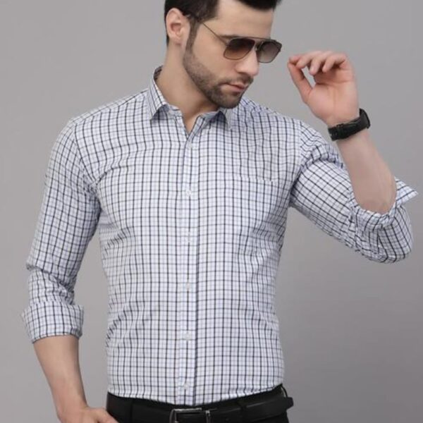 The "FOMO Men Regular Fit Checked Formal Shirt" is a stylish and formal shirt designed for men. It features a regular fit, providing comfort while maintaining a professional and polished look. The shirt is adorned with a checked pattern, adding a touch of sophistication to the overall design. This formal shirt is suitable for various occasions, including professional settings and formal events. Crafted with quality materials, it ensures durability and a smart appearance. Elevate your formal wardrobe with the FOMO Men Regular Fit Checked Formal Shirt, perfect for making a confident and fashionable statement in Indian formal attire.
